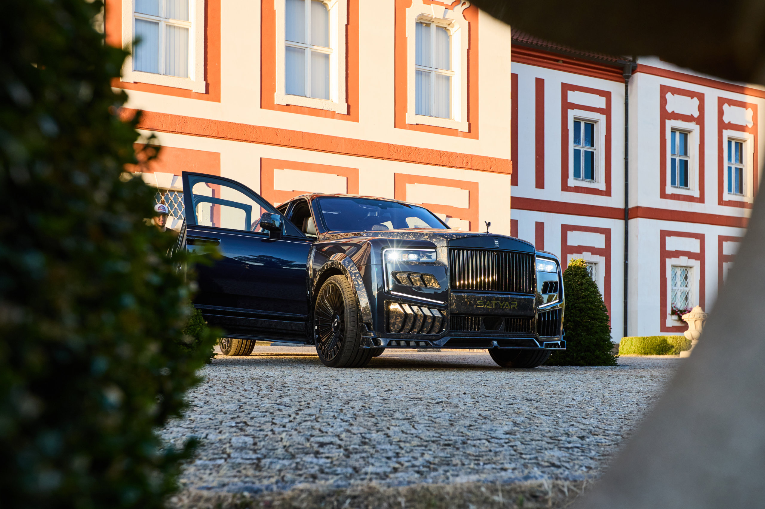 Cullinan by SATYAR in the palace courtyard, doors open